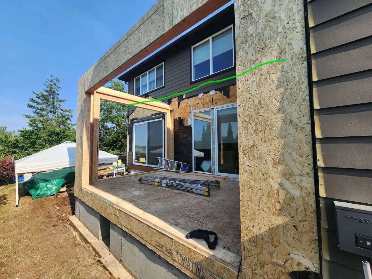 Open frame of an ongoing project for general home renovation with tools and ladders ready for installation work.