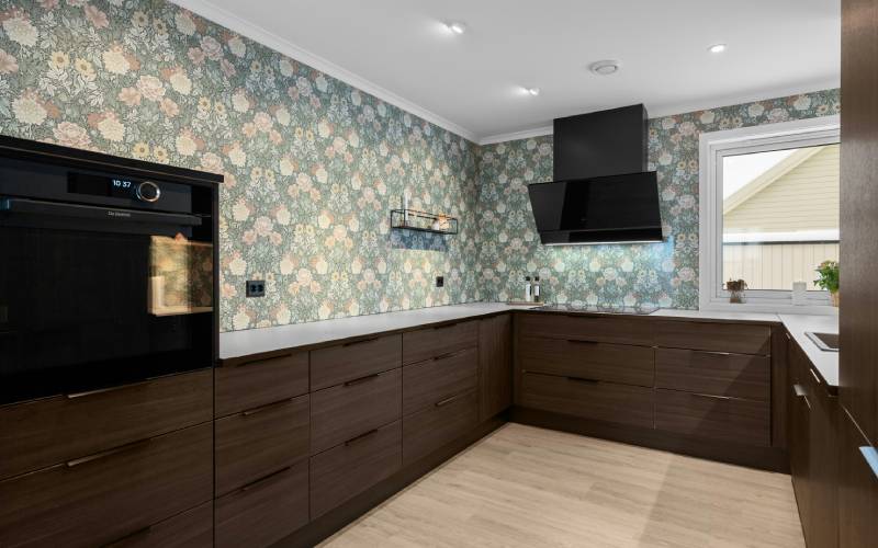 Modern kitchen with dark laminate cabinets